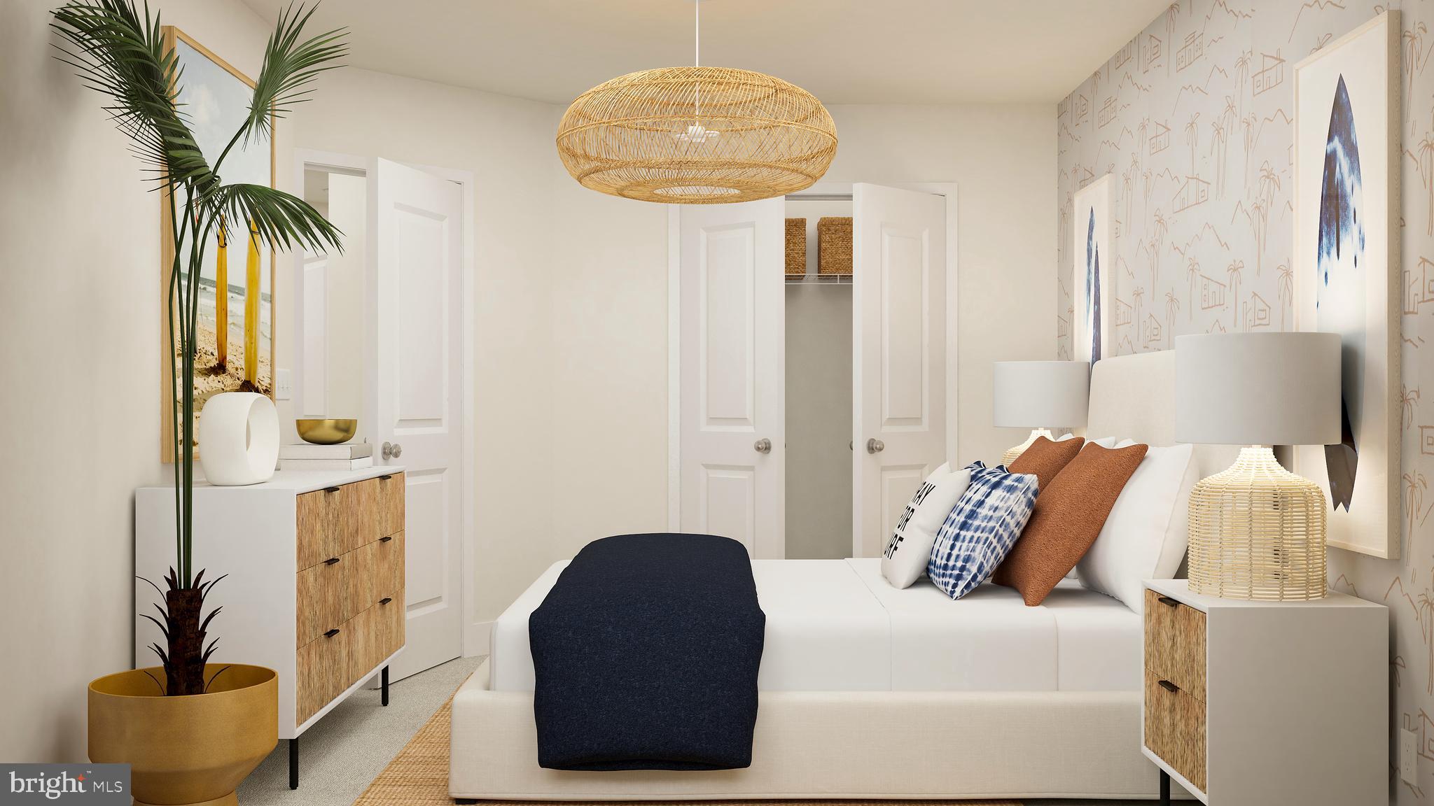 7612 Johnnycake Road Windsor Mill, MD 21244 - Photo 7 of 11 a bedroom with a bed and a chandelier