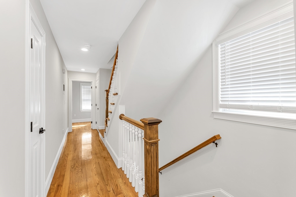 17 June Street, Unit 2 Boston, MA 02131 - Photo 15 of 31 a view of a hallway with a dining room
