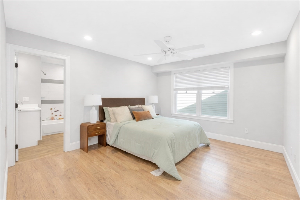 17 June Street, Unit 2 Boston, MA 02131 - Photo 21 of 31 a bedroom with a bed and window