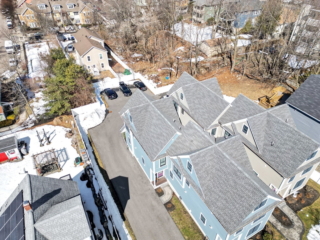 17 June Street, Unit 2 Boston, MA 02131 - Photo 29 of 31 an aerial view of a house with a yard