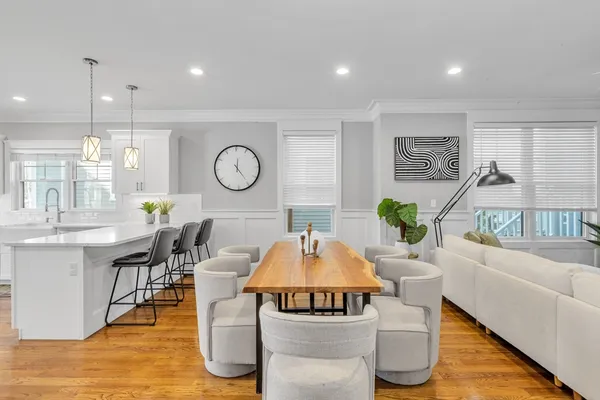 a living room with furniture and a table
