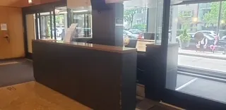 a view of a hallway with an entryway in a room