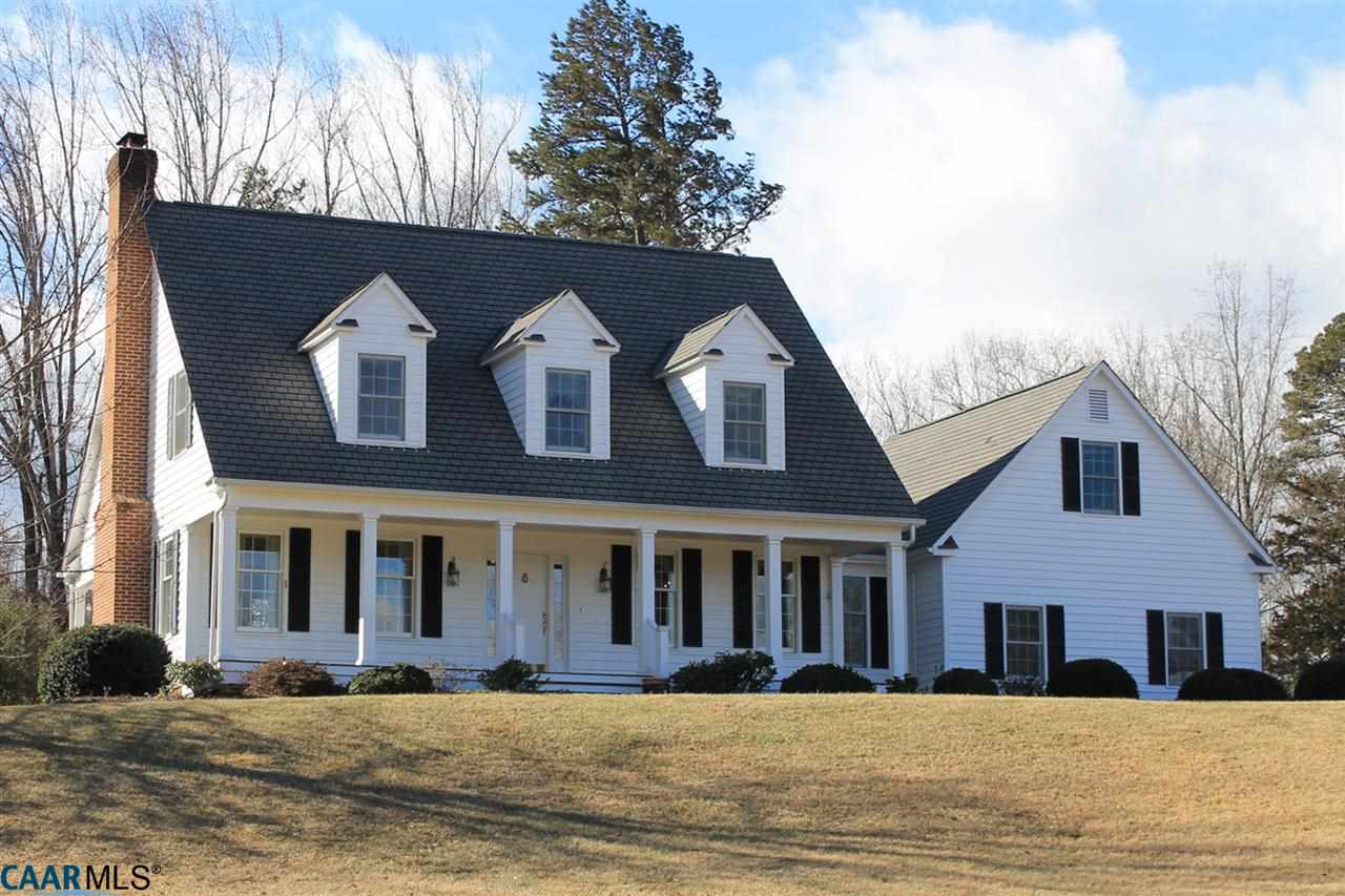 a front view of residential houses with yard