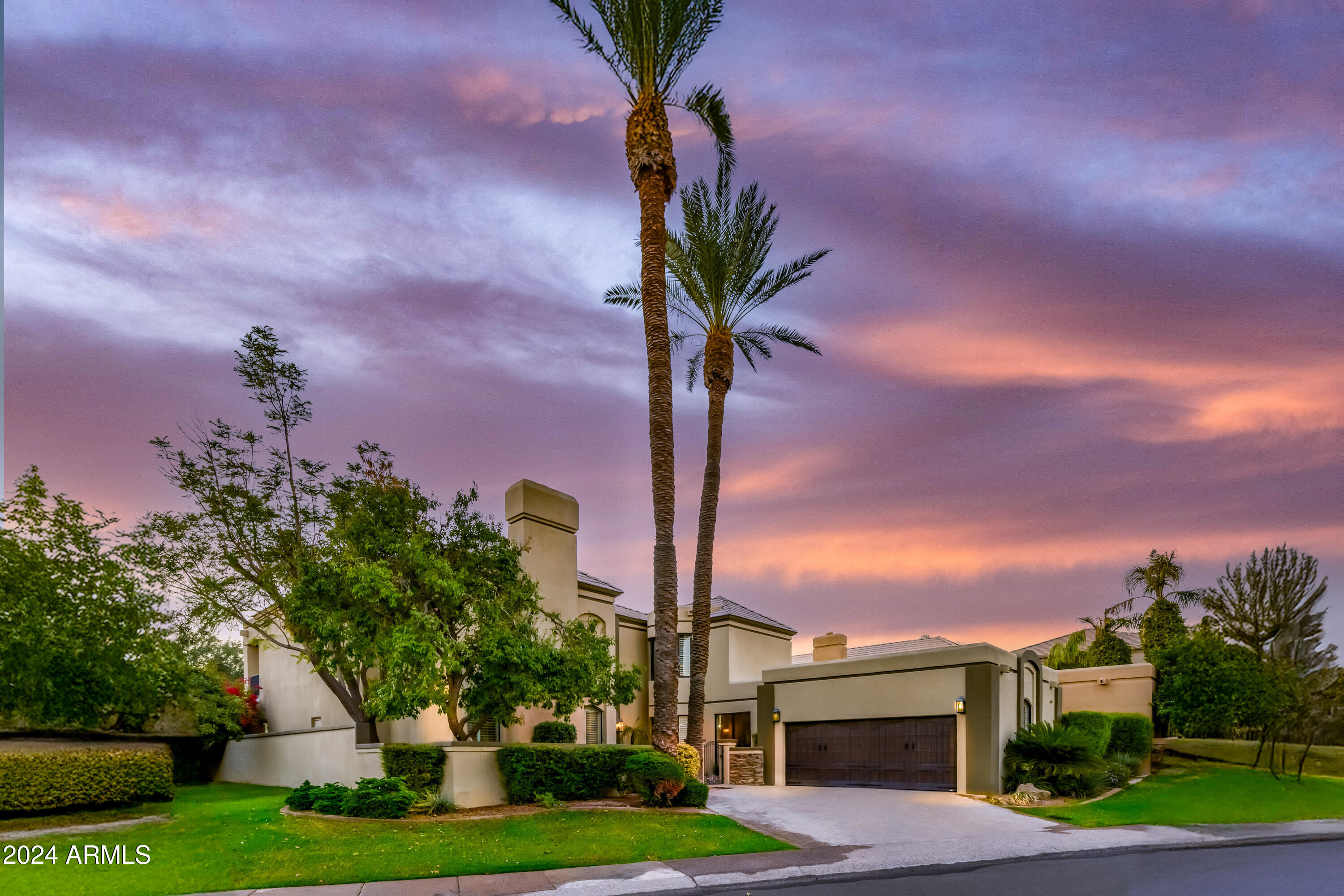 7878 East Gainey Ranch Road, Unit 25 Scottsdale, AZ 85258 - Photo 3 of 57 Front Entry at Twilight