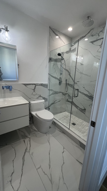 726 East 8th Street, Unit 3 Boston, MA 02127 - Photo 11 of 11 a bathroom with a sink toilet and shower