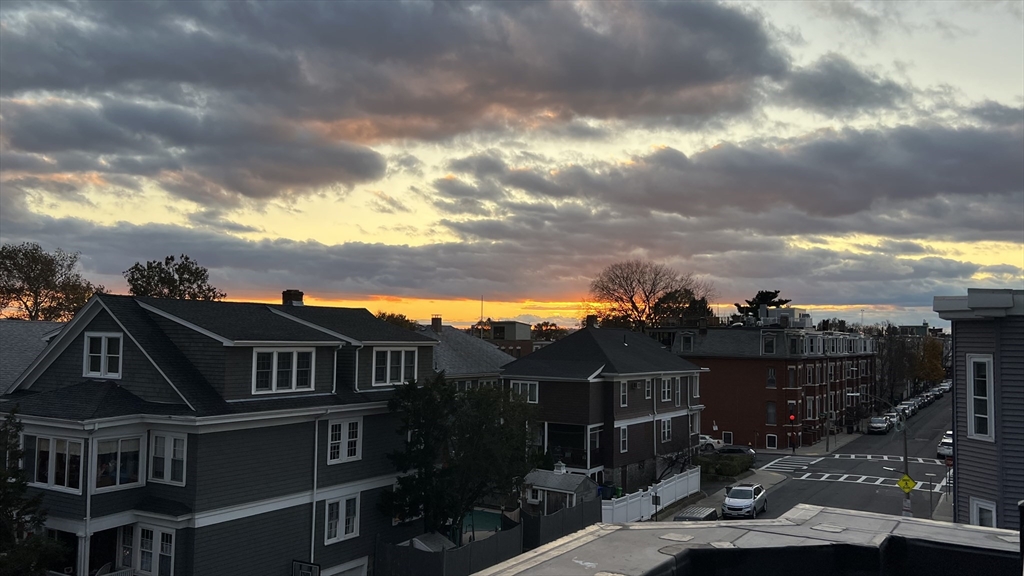 726 East 8th Street, Unit 3 Boston, MA 02127 - Photo 6 of 11 a view of a house with a yard