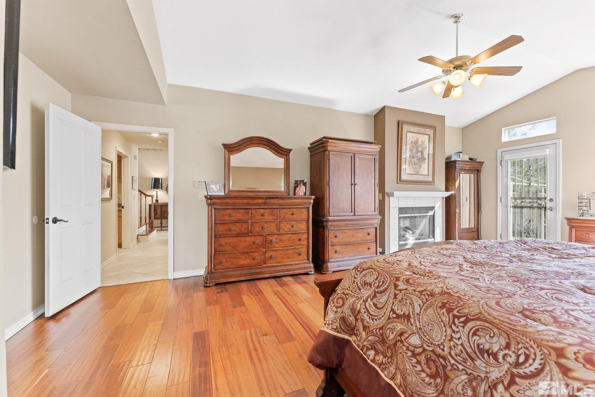 6444 Brookview Circle Reno, NV 89519 - Photo 15 of 32 a bedroom with a bed and a dresser