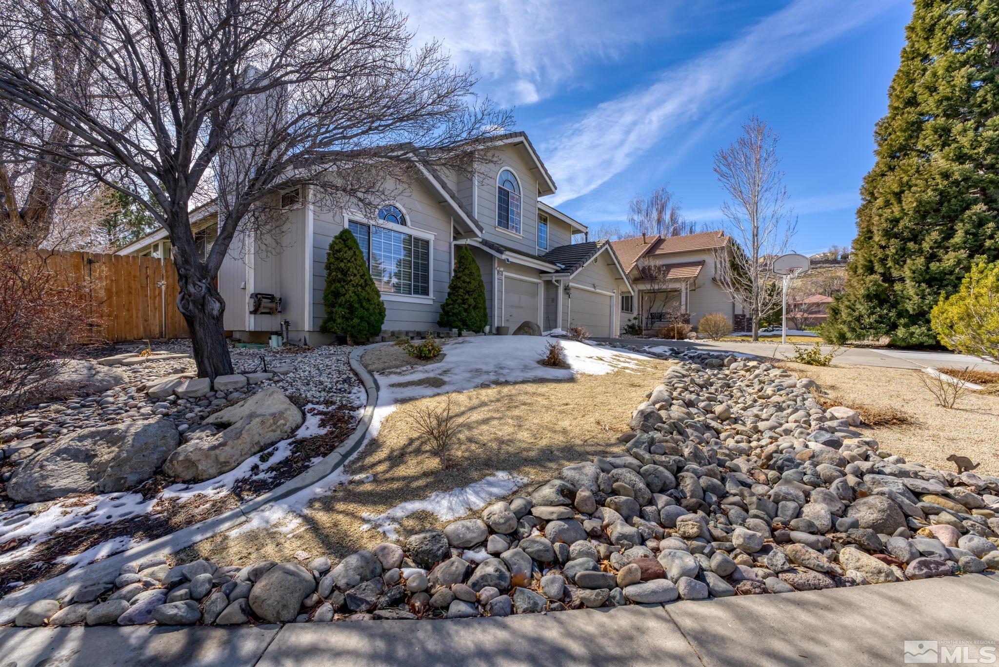 6444 Brookview Circle Reno, NV 89519 - Photo 2 of 32 a view of a house with a yard covered in snow