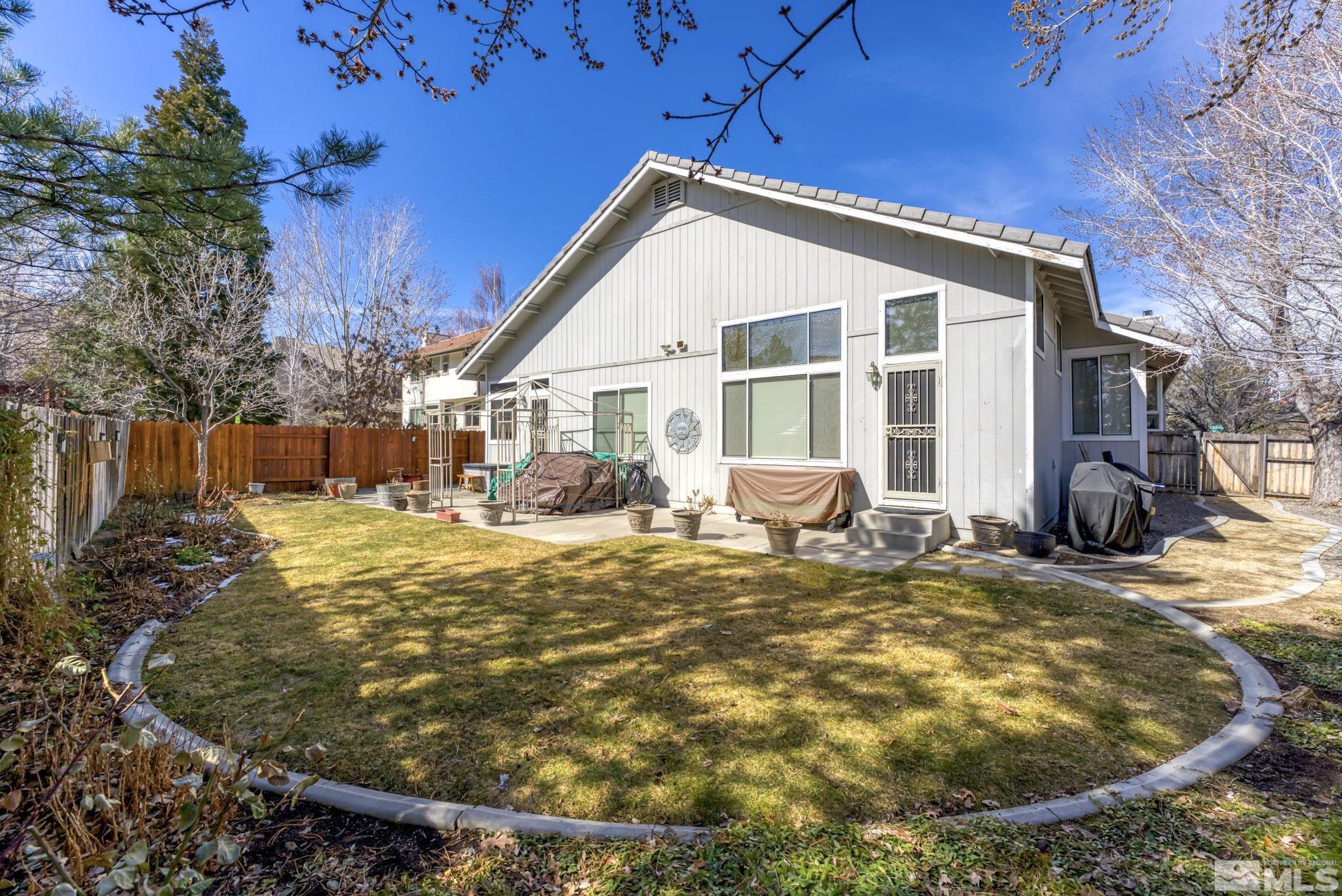 6444 Brookview Circle Reno, NV 89519 - Photo 26 of 32 a view of a house with backyard and sitting area