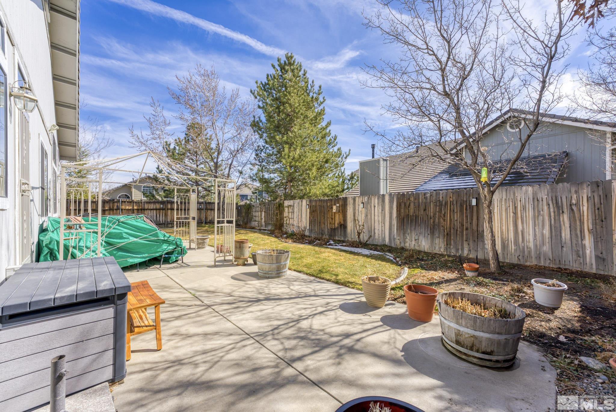 6444 Brookview Circle Reno, NV 89519 - Photo 29 of 32 a view of a backyard with a patio