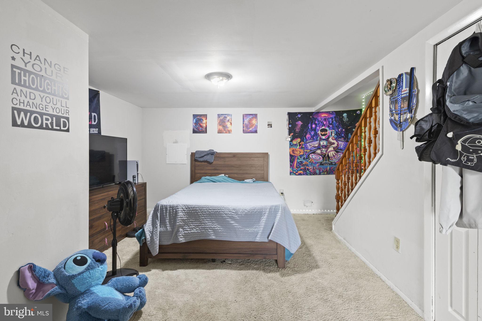 9 Slavin Court, Unit 2H Nottingham, MD 21236 - Photo 13 of 22 a bedroom with a bed and a walk in closet