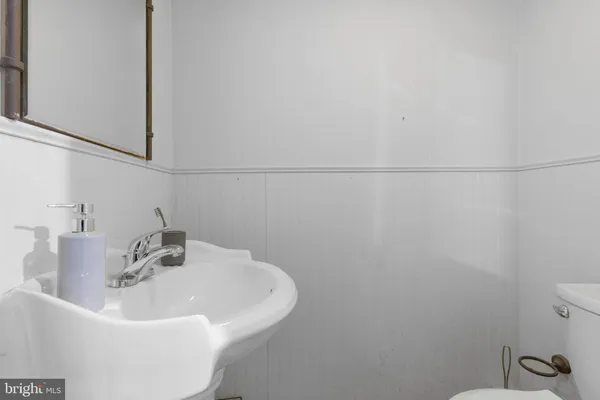 a bathroom with a sink and a toilet