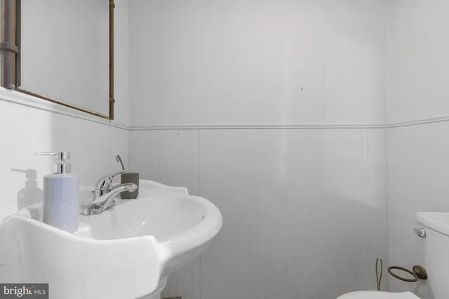 a bathroom with a sink and a toilet