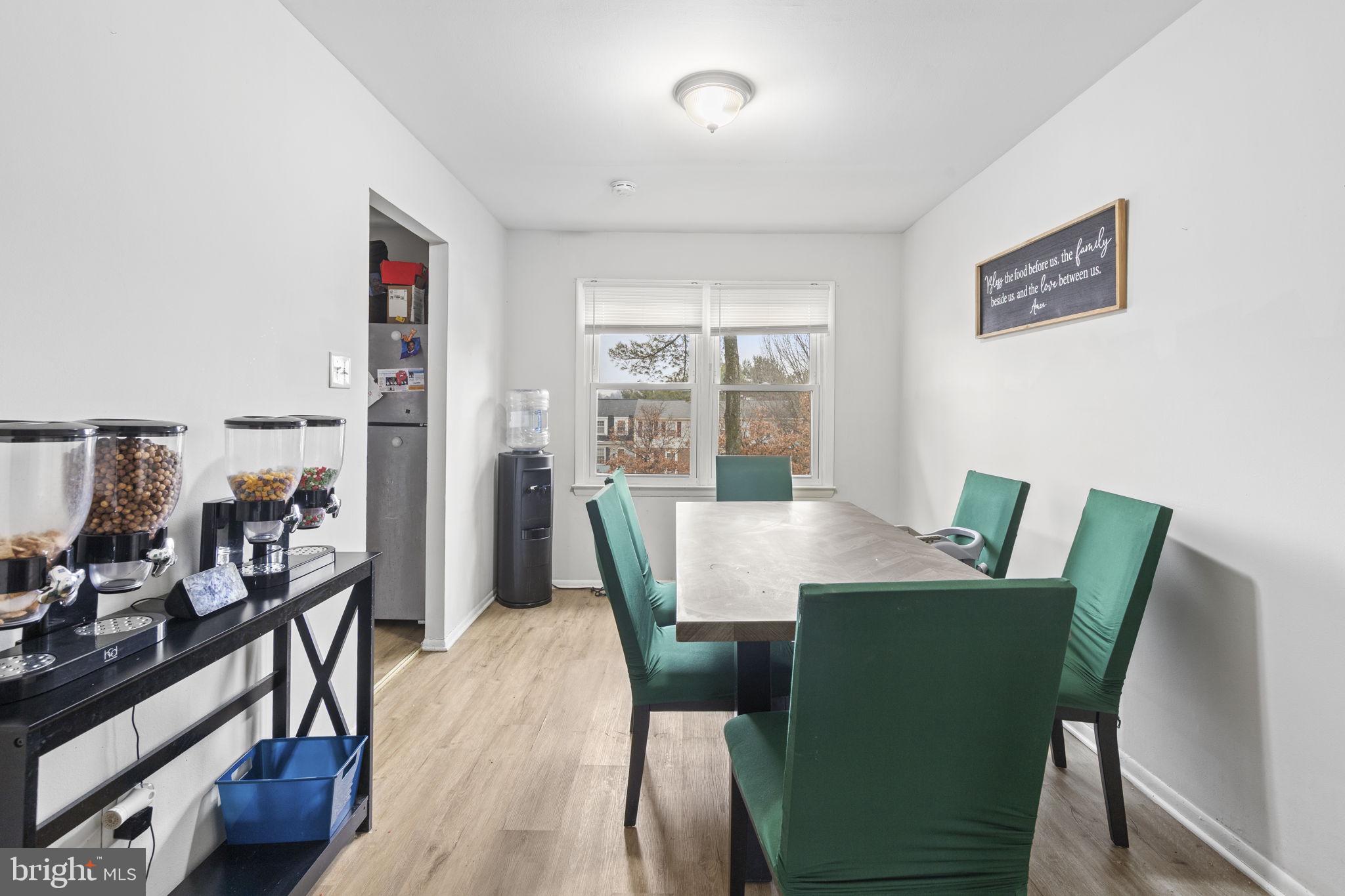 9 Slavin Court, Unit 2H Nottingham, MD 21236 - Photo 4 of 22 a view of a dining room with furniture window and outside view
