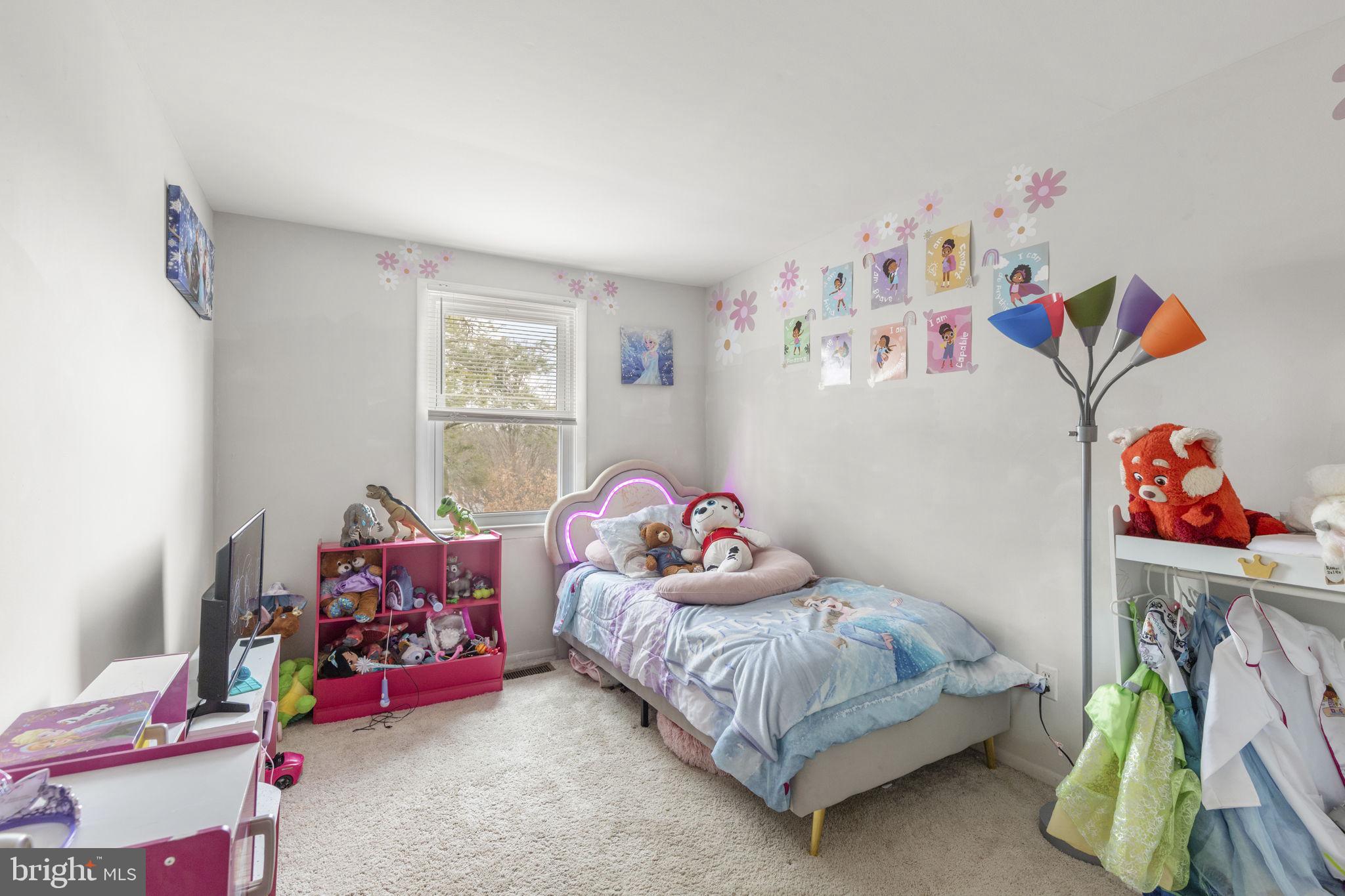 9 Slavin Court, Unit 2H Nottingham, MD 21236 - Photo 9 of 22 a bedroom with toys and a couch