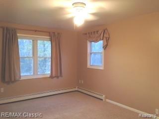 5600 North Fleming Road Fowlerville, MI 48836 - Photo 31 of 34 bedroom.jpg