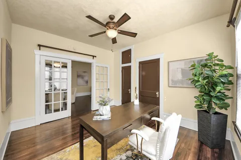 a workspace with furniture and window