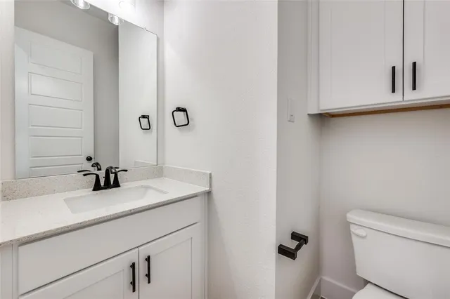 a bathroom with a sink and a toilet