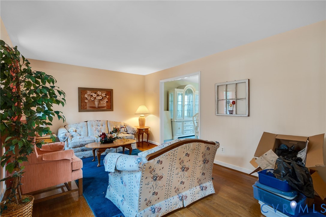 1913 Raintree Drive Henrico, VA 23238 - Photo 12 of 39 a living room with furniture and wooden floor