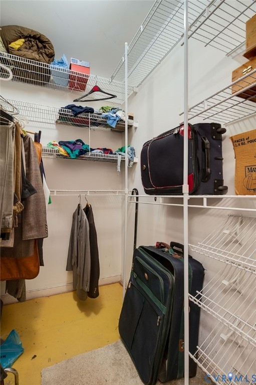 1913 Raintree Drive Henrico, VA 23238 - Photo 29 of 39 a view of walk in closet with clothes and shoes