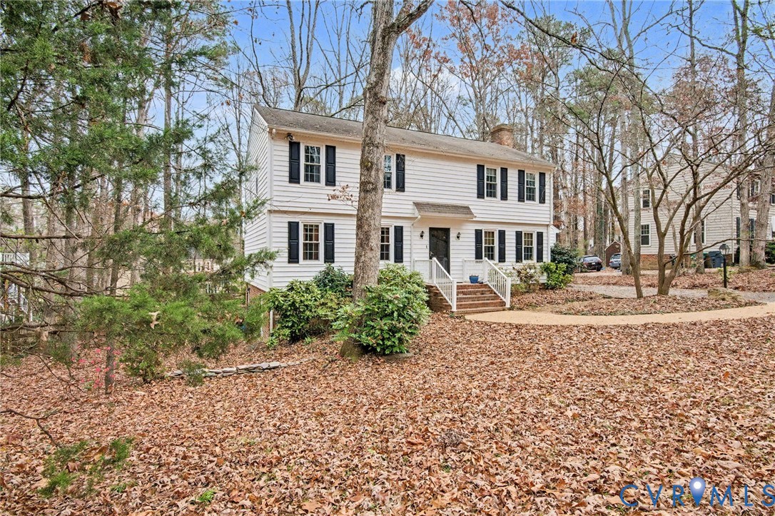 1913 Raintree Drive Henrico, VA 23238 - Photo 4 of 39 a front view of a house with a yard