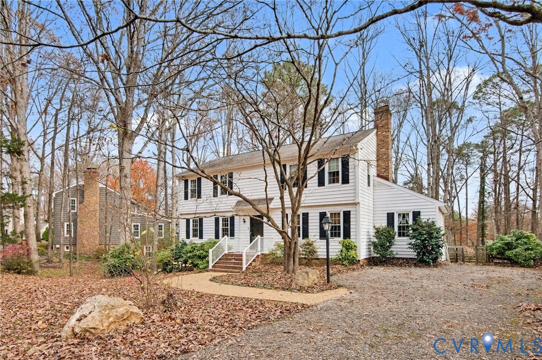 1913 Raintree Drive Henrico, VA 23238 - Photo 5 of 39 a front view of a house with a yard