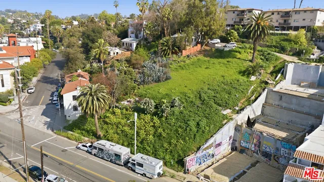 an aerial view of residential house with outdoor space