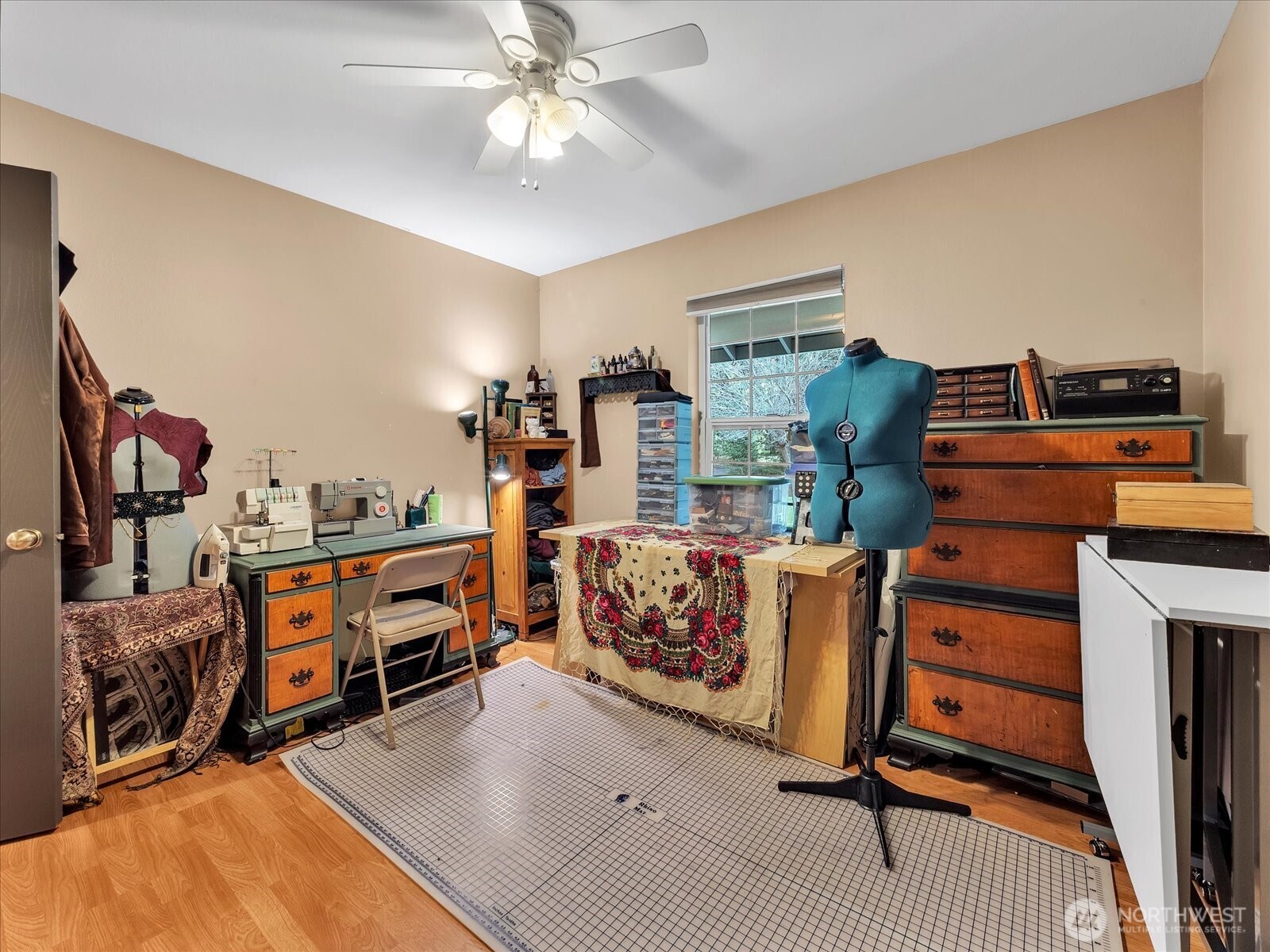 7417 Silvana Terrace Road Stanwood, WA 98292 - Photo 20 of 38 a view of a bedroom with workspace and windows