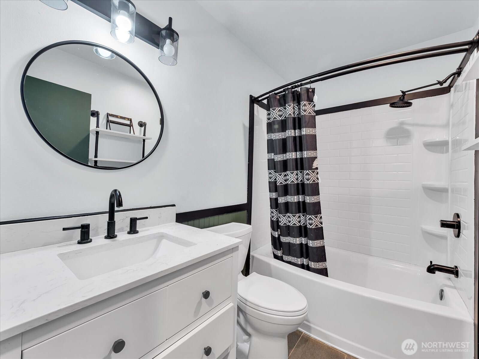 7417 Silvana Terrace Road Stanwood, WA 98292 - Photo 25 of 38 a bathroom with a sink toilet and shower