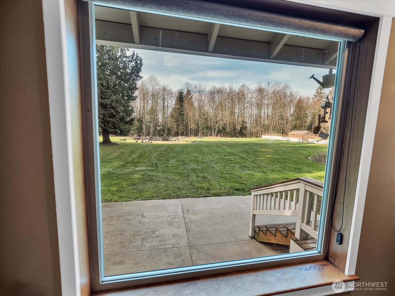 7417 Silvana Terrace Road Stanwood, WA 98292 - Photo 27 of 38 a view of a back yard from a window