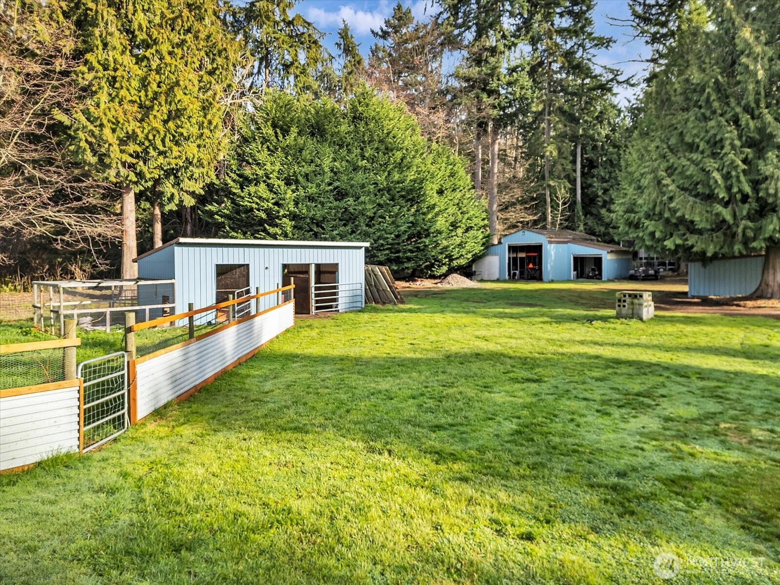 7417 Silvana Terrace Road Stanwood, WA 98292 - Photo 29 of 38 a view of house with a big yard and large trees