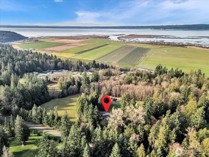 a view of swimming pool with a yard and outdoor seating