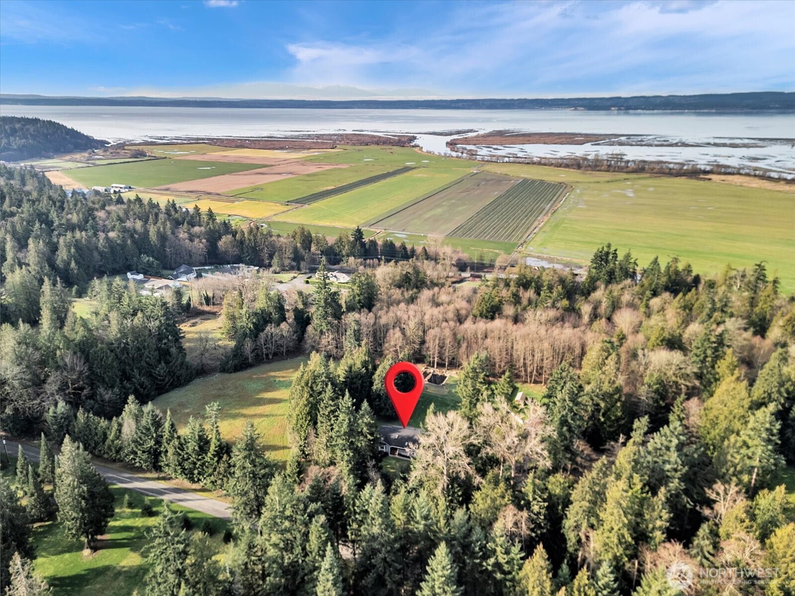7417 Silvana Terrace Road Stanwood, WA 98292 - Photo 36 of 38 a view of swimming pool with a yard and outdoor seating