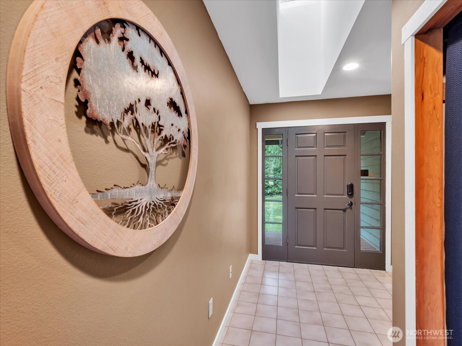7417 Silvana Terrace Road Stanwood, WA 98292 - Photo 6 of 38 a view of a hallway with wooden shelves