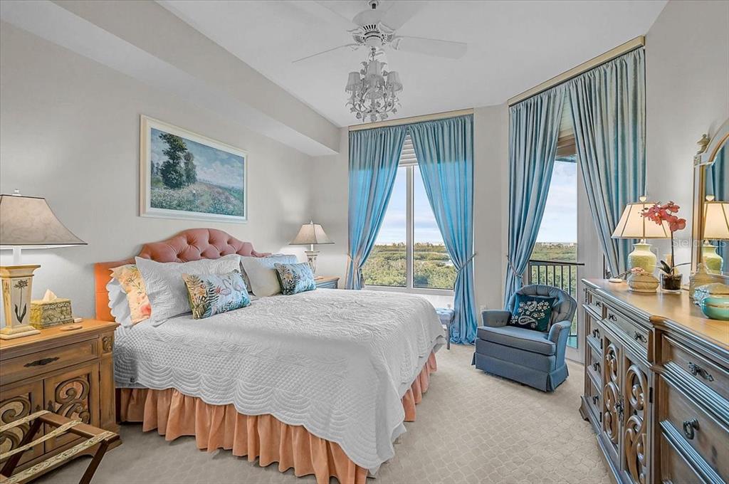 409 North Point Road, Unit 902 Osprey, FL 34229 - Photo 18 of 59 a bedroom with bed and a window