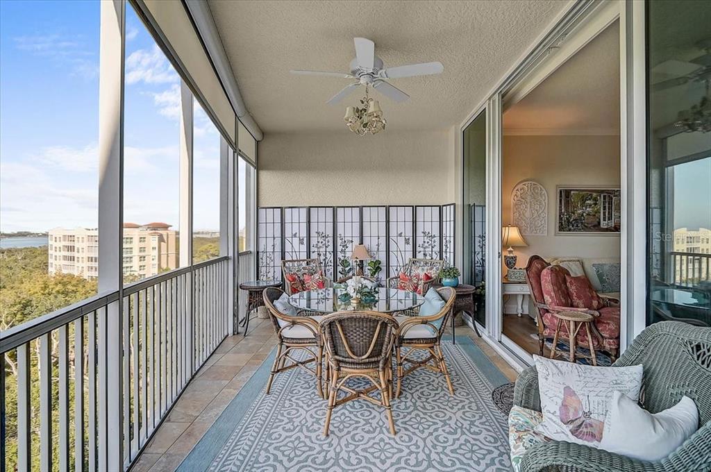 409 North Point Road, Unit 902 Osprey, FL 34229 - Photo 31 of 59 a outdoor living space with furniture