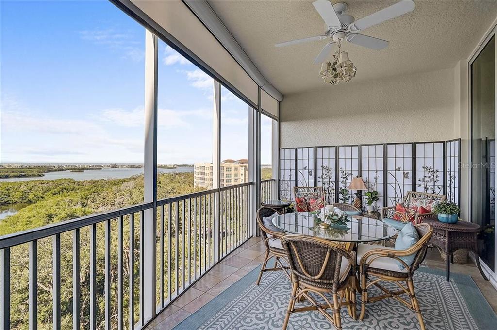 409 North Point Road, Unit 902 Osprey, FL 34229 - Photo 32 of 59 a dining room with furniture window and outside view