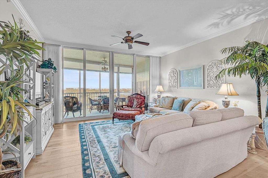 409 North Point Road, Unit 902 Osprey, FL 34229 - Photo 9 of 59 a bed room with a bed and a couch