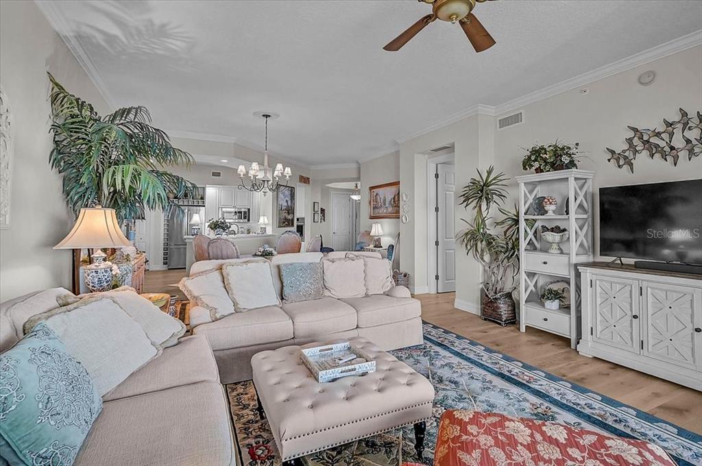 409 North Point Road, Unit 902 Osprey, FL 34229 - Photo 10 of 59 a living room with furniture and a flat screen tv