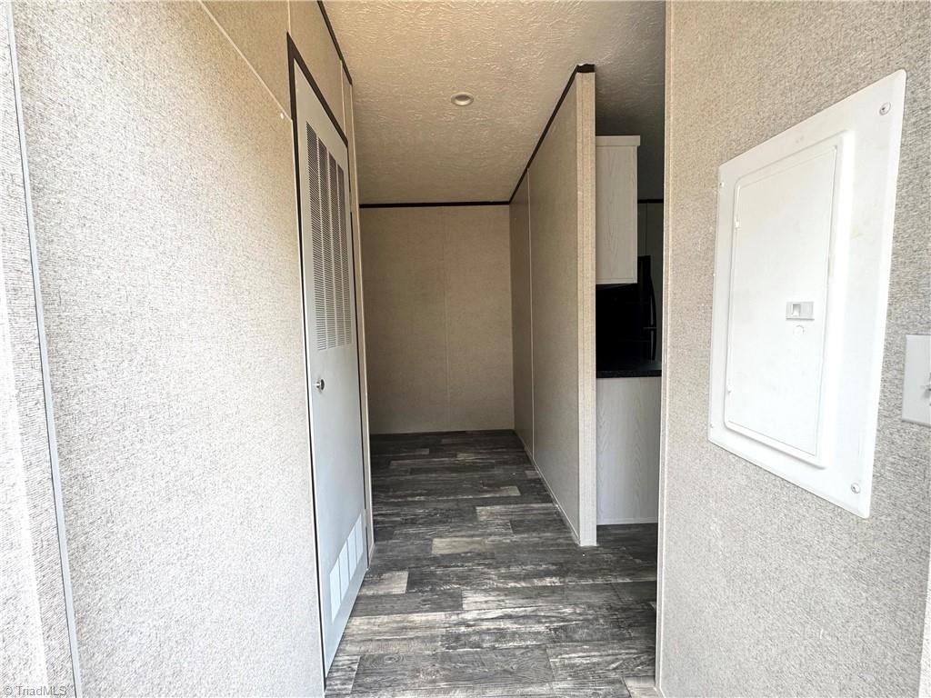 899 Maple Grove Hays, NC 28635 - Photo 12 of 22 Back door enters into laundry/mud room.