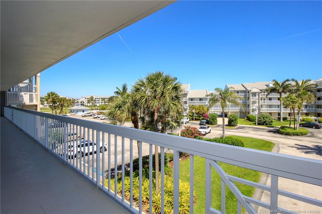 20 Northeast Plantation Road, Unit 205 Jensen Beach, FL 34957 - Photo 4 of 30 a view of city from a balcony