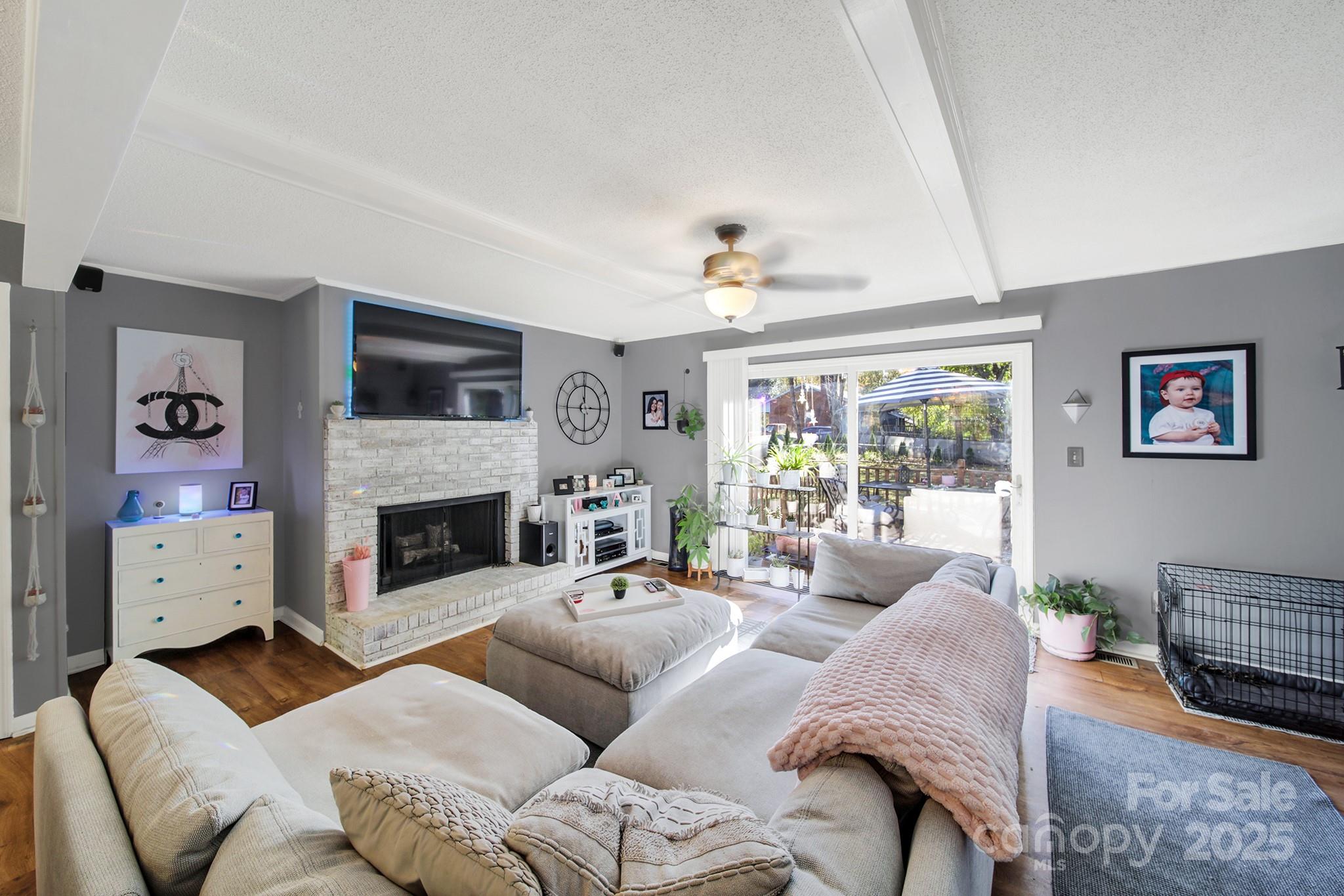 1517 University Drive Lancaster, SC 29720 - Photo 14 of 29 a living room with furniture and a fireplace