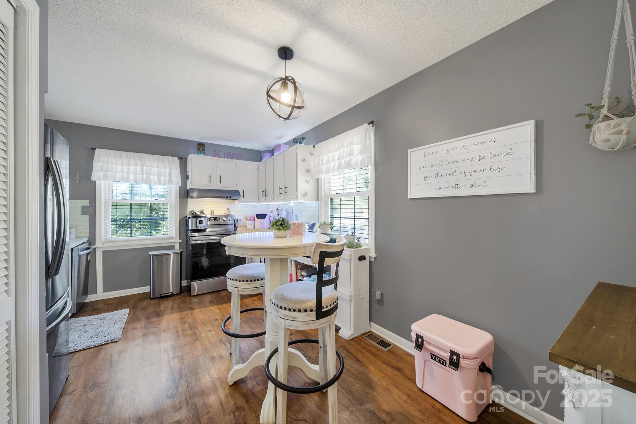 1517 University Drive Lancaster, SC 29720 - Photo 24 of 29 a kitchen that has a cabinets counter space and appliances