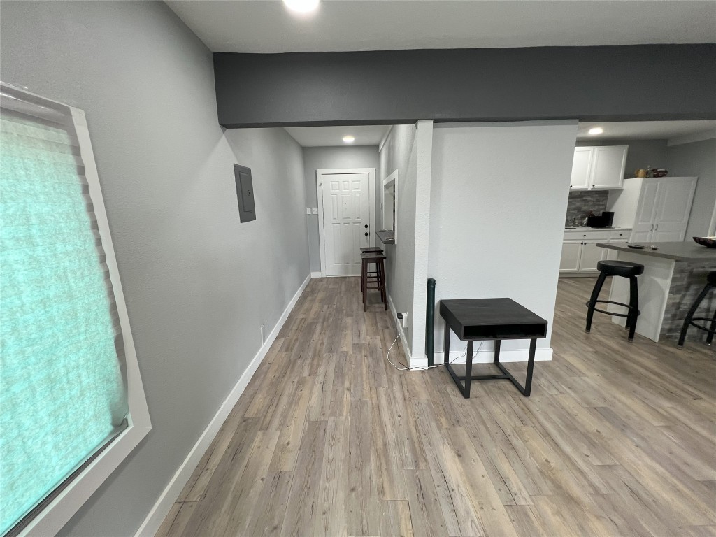 128 Skyview Terrace, Unit B Leander, TX 78641 - Photo 18 of 24 a view of dining room with furniture and wooden floor