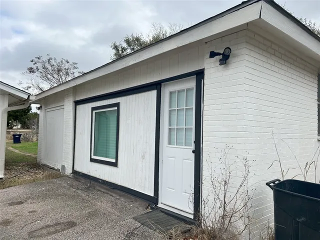 a view of a porch with a bench