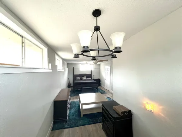 a kitchen with a stove and a window