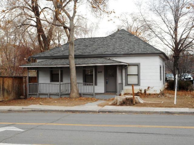 647 Valley Road Reno, NV 89512 - Photo 1 of 1 a house that has a tree in front of it