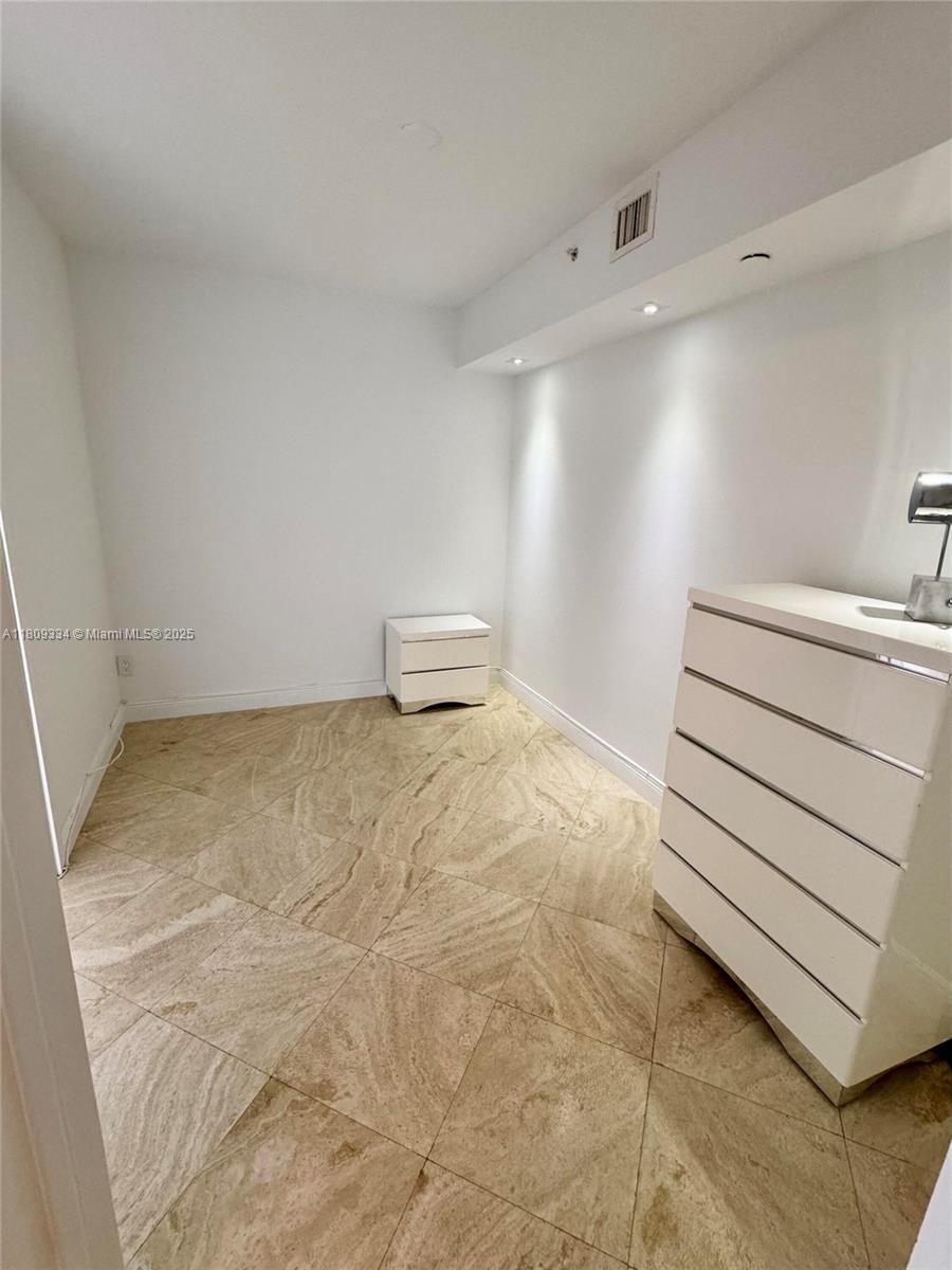 4779 Collins Avenue, Unit 2106 Miami Beach, FL 33140 - Photo 11 of 25 a bathroom with a sink