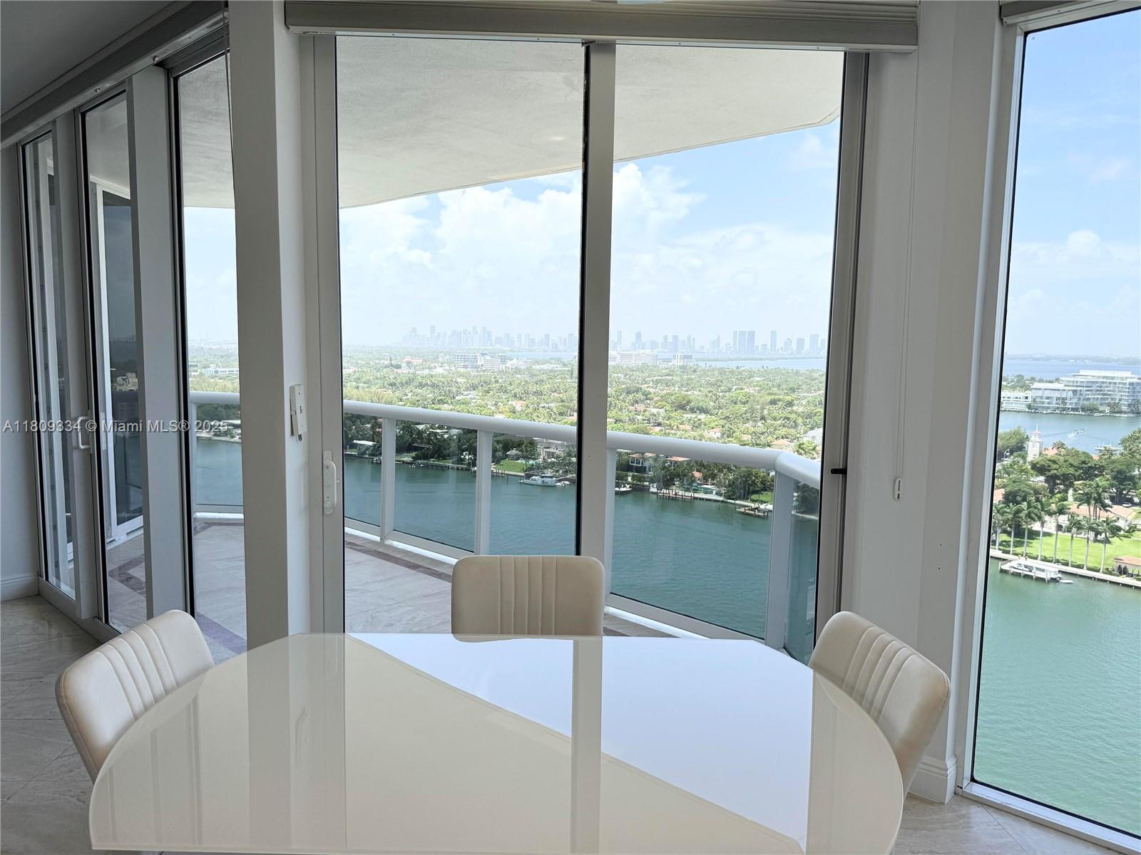 4779 Collins Avenue, Unit 2106 Miami Beach, FL 33140 - Photo 8 of 25 a balcony view with a couch