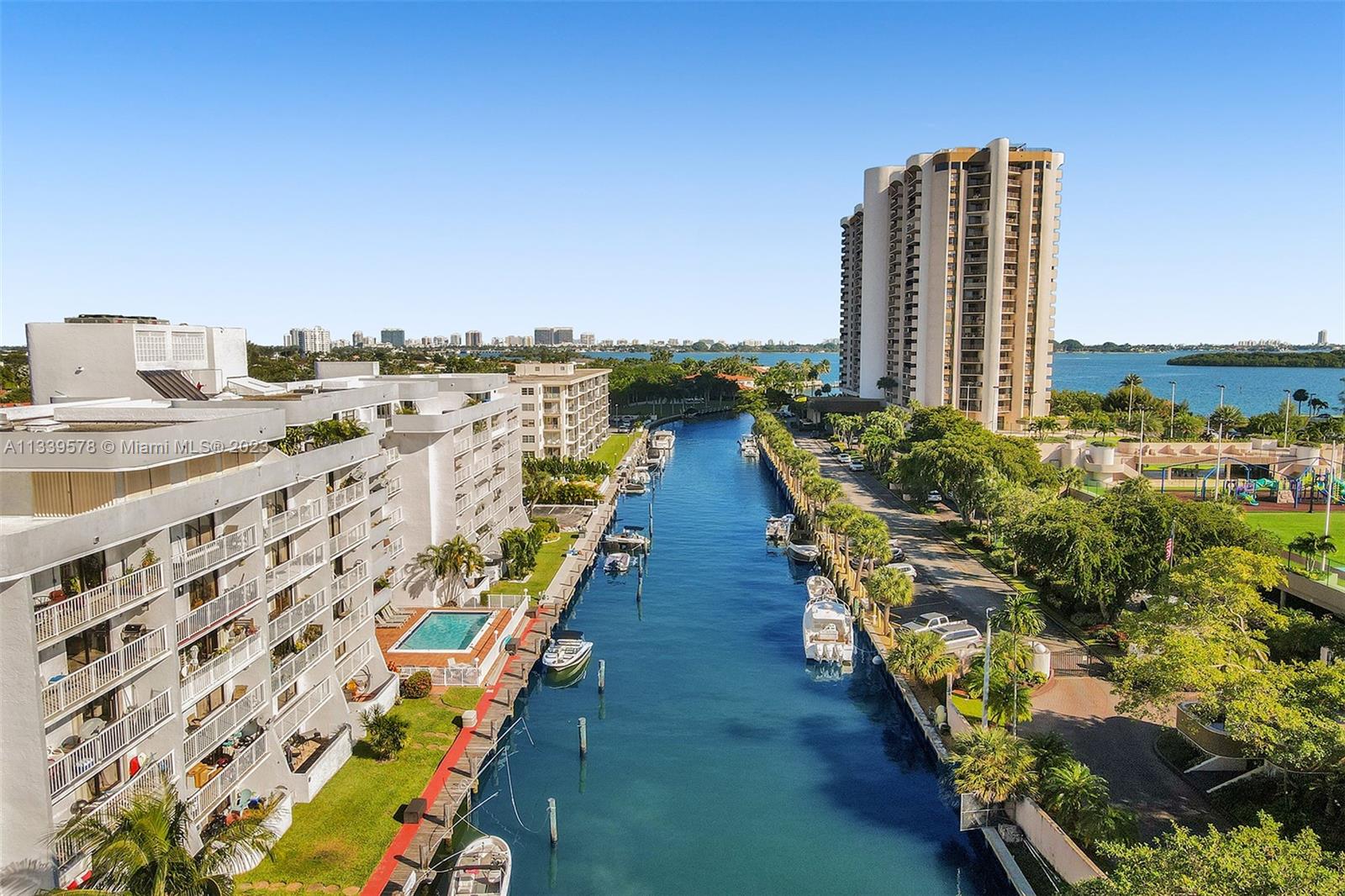 1650 Northeast 115th Street, Unit 102 Miami, FL 33181 - Photo 3 of 35 a view of a city with tall buildings